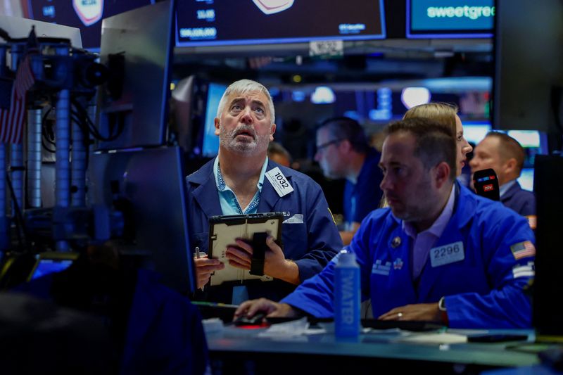 Traders work on the floor of the New York Stock Exchange (NYSE) in New York City, U.S., August 7, 2026. REUTERS/Jeenah Moon