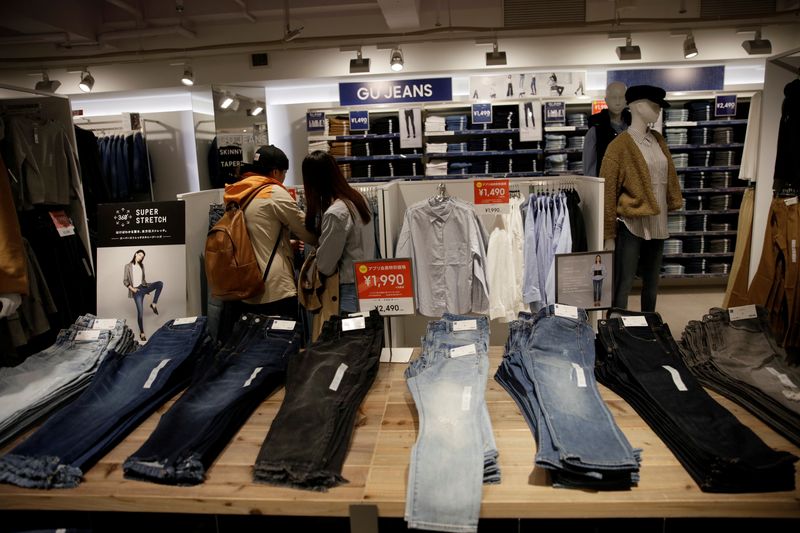 Clothes are shown at a GU shop by Fast Retailing in Osaka, western Japan October 22, 2017.   REUTERS/Thomas White
