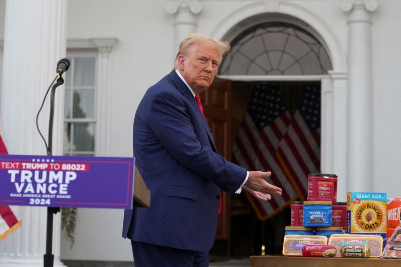 FILE PHOTO: Republican presidential nominee and former U.S. President Donald Trump gestures as he attends a press conference at Trump National Golf Club, in Bedminster, New Jersey, U.S., August 15, 2024. REUTERS/Jeenah Moon/File Photo