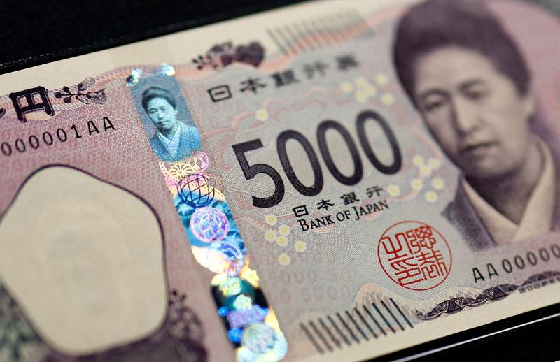 Holograms, which show different images and colours depending on the angle at which they are viewed, are seen on the new Japanese 5,000 yen banknote as the new note is displayed at a currency museum of the Bank of Japan, on the day the new notes of 10,000 yen, 5,000 yen and 1,000 yen went into circulation, in Tokyo, Japan July 3, 2024. REUTERS/Issei Kato/Pool