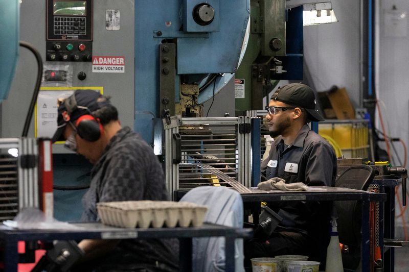 Factory workers operate machine presses at Abipa Canada in Boisbriand, Quebec, Canada May 10, 2023. REUTERS/Evan Buhler