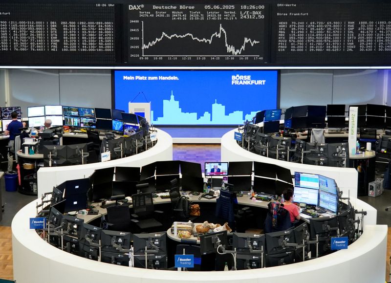 FILE PHOTO: The German DAX share price index graph is displayed at the stock exchange in Frankfurt, Germany, June 5, 2025.  REUTERS/Staff/ File Photo