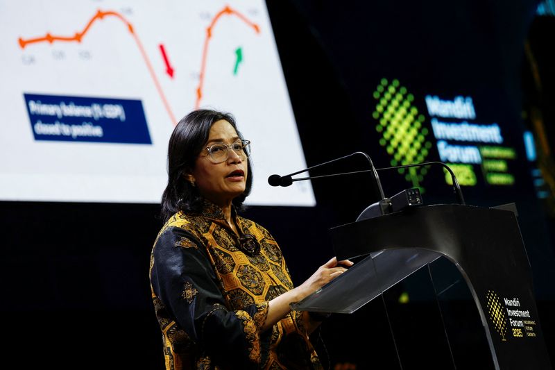 FILE PHOTO: Indonesia's Finance Minister Sri Mulyani Indrawati delivers her speech during the Mandiri Investment Forum in Jakarta, Indonesia, February 11, 2025. REUTERS/Willy Kurniawan/ File Photo