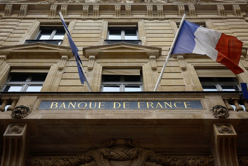 FILE PHOTO: A French flag flies at the entrance of the Bank of France "Banque de France" building in Paris, France, December 18, 2024. REUTERS/Sarah Meyssonnier/File Photo
