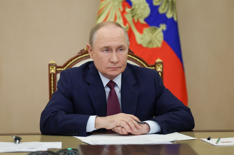 Russian President Vladimir Putin attends a meeting with members of the government via a video link in Moscow, Russia, September 17, 2025. Sputnik/Vyacheslav Prokofyev/Pool via REUTERS ATTENTION EDITORS - THIS IMAGE WAS PROVIDED BY A THIRD PARTY.