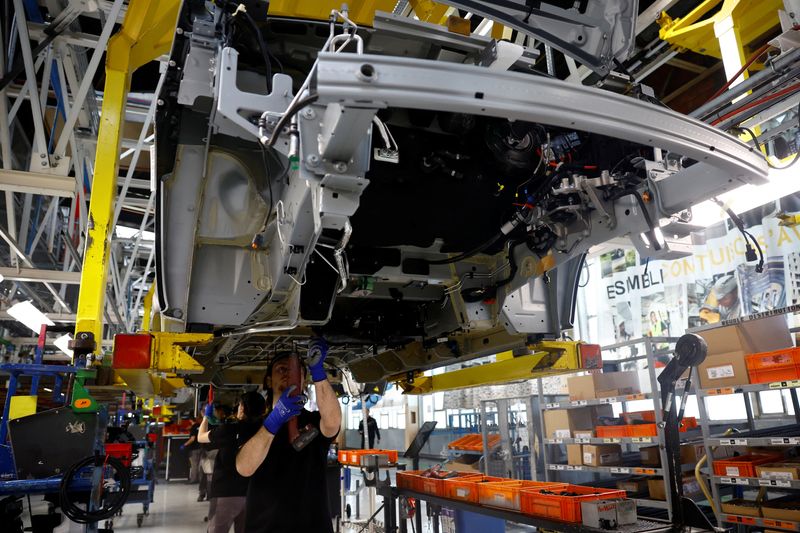 FILE PHOTO: Employees work on the automobile assembly line of Renault Trafic vehicles at the Renault Sandouville car factory, near Le Havre, France, March 29, 2024. REUTERS/Sarah Meyssonnier/File Photo