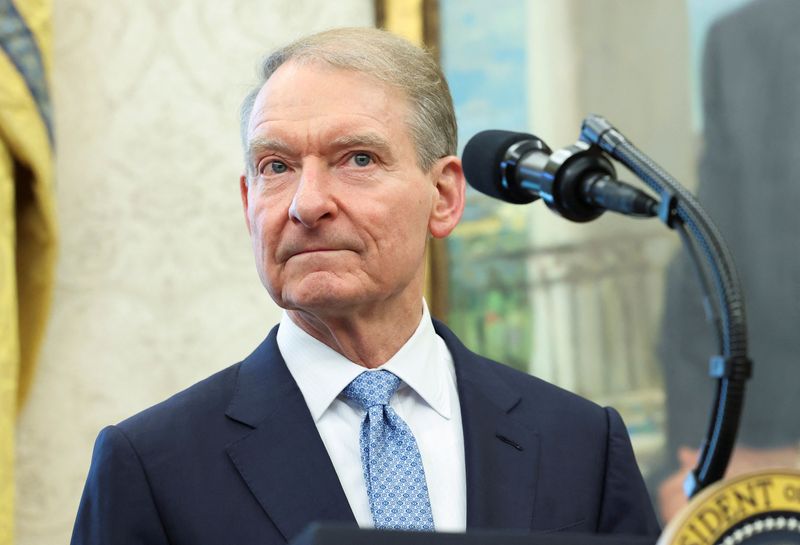 FILE PHOTO: Chairman of the Securities and Exchange Commission (SEC) Paul Atkins looks on during his swearing-in ceremony, at the White House in Washington, D.C., U.S., April 22, 2025. REUTERS/Kevin Lamarque/File Photo