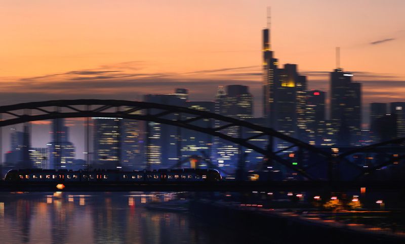 A commuter train passes by the skyline with its financial district in Frankfurt, Germany, October 25, 2021.  REUTERS/Kai Pfaffenbach