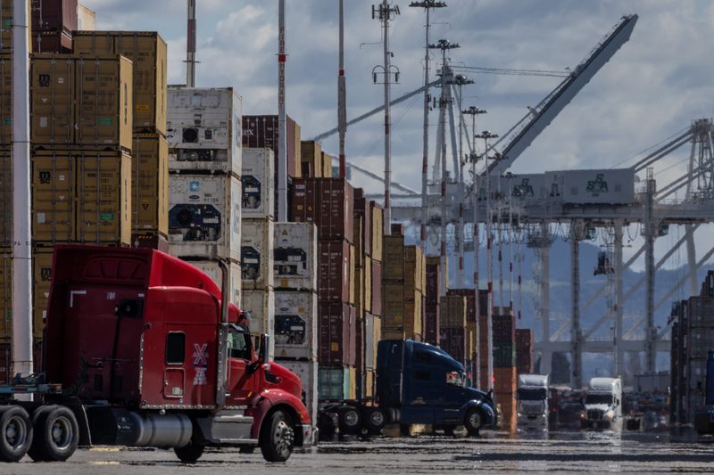 Shipping containers are seen at the port of Oakland, as trade tensions escalate over U.S. tariffs, in Oakland, California, U.S., March 6, 2025. REUTERS/Carlos Barria