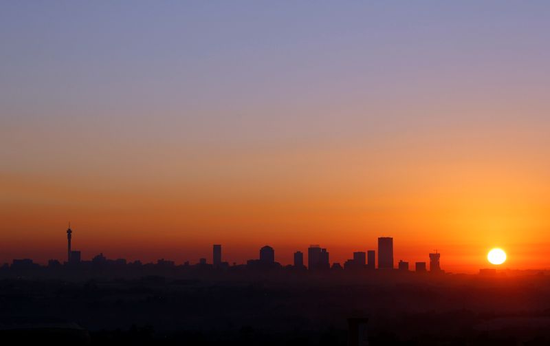 A general view of the city of Johannesburg is seen as the sun rises, in Johannesburg, South Africa, June 20, 2019. REUTERS/Siphiwe Sibeko