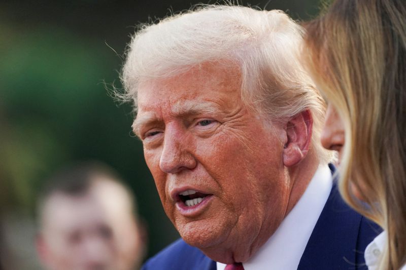 FILE PHOTO: U.S. President Donald Trump attends the Congressional Picnic at the White House in Washington, D.C., U.S., June 12, 2025. REUTERS/Nathan Howard/File Photo
