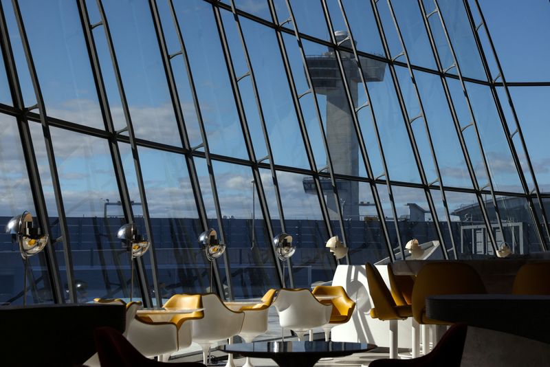 The John F. Kennedy (JFK) International Airport's air traffic control (ATC) tower as seen from the TWA Hotel in the borough of Queens, New York City, U.S., October 10, 2025.REUTERS/Shannon Stapleton