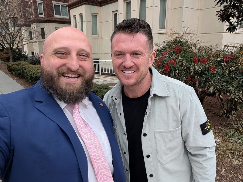 British far-right anti-Islam activist Tommy Robinson, whose real name is Stephen Yaxley-Lennon, poses for a photo with U.S. State Department official Joe Rittenhouse in Washington, D.C., U.S., February 25, 2026. Joe Rittenhouse via X/Handout via REUTERS
