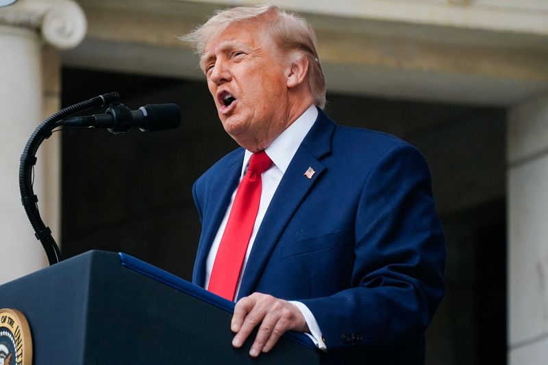 U.S. President Donald Trump delivers remarks in the Memorial Amphitheater during a Memorial Day event at Arlington National Cemetery, Arlington, Virginia, U.S., May 25, 2026. REUTERS/Nathan Howard