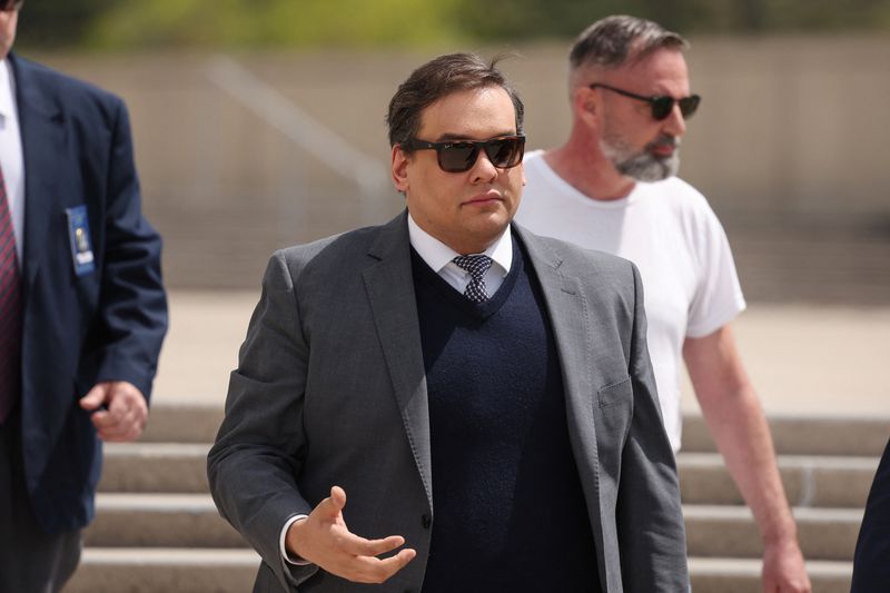 FILE PHOTO: George Santos, who was expelled from the U.S. House of Representatives, departs after the sentencing in his criminal corruption charges at Central Islip Federal Courthouse in Central Islip, New York, U.S., April 25, 2025. REUTERS/Shannon Stapleton/File Photo