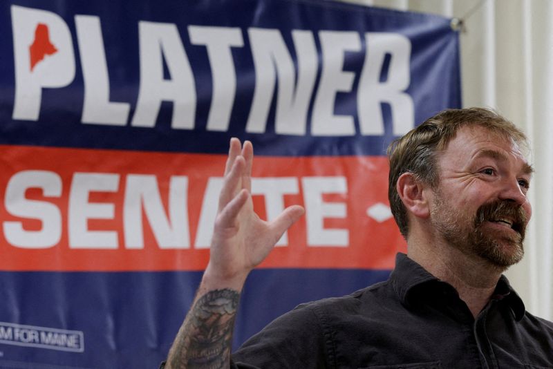FILE PHOTO: Democratic candidate for U.S. Senate Graham Platner speaks at a campaign town hall meeting in Portland, Maine, U.S., June 7, 2026.  REUTERS/Brian Snyder/File Photo