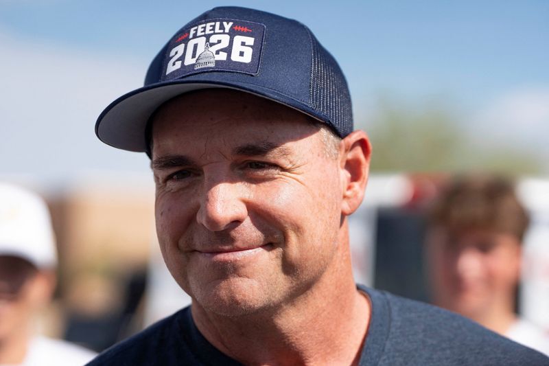 Republican candidate for U.S. Congress, in Arizona's first congressional district, Jay Feely, speaks to members of the media at a polling location at Fountain Hills Community Center during Arizona's primary election in Fountain Hills, Arizona, U.S., July 21, 2026.  REUTERS/Rebecca Noble