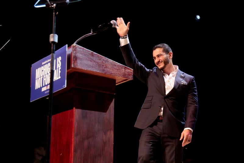 U.S. Senate Democratic candidate Abdul El-Sayed waves on stage, with vote counting continuing for Michigan's Democratic U.S. Senate primary, during an election night rally in Detroit, Michigan, U.S., August 5, 2026. REUTERS/Rebecca Cook