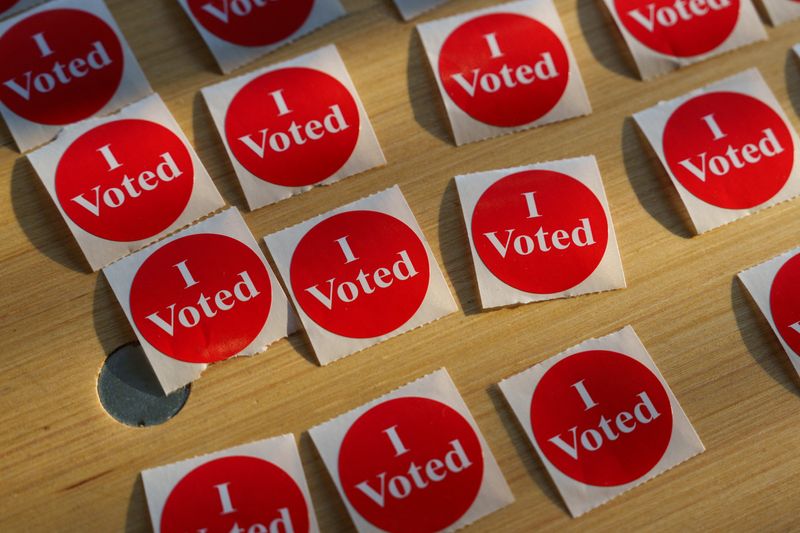 Voting stickers lay on a table at a voting site on primary election day in Minneapolis, Minnesota, U.S., August 11, 2026. REUTERS/Tim Evans