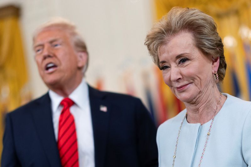 U.S. Secretary of Education Linda McMahon smiles during the signing event for an executive order to shut down the Department of Education next to U.S. President Donald Trump, in the East Room at the White House in Washington, D.C., U.S., March 20, 2025. REUTERS/Carlos Barria