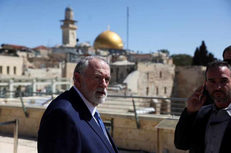 FILE PHOTO: U.S. Ambassador to Israel Mike Huckabee looks on during the day he visits the Western Wall, Judaism's holiest prayer site, in Jerusalem's Old City, April 18, 2025. REUTERS/Ronen Zvulun/File photo