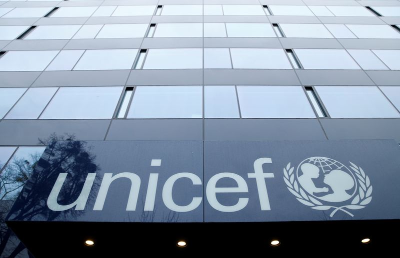 FILE PHOTO: A UNICEF logo is pictured outside their offices in Geneva, Switzerland, January 30, 2017. Picture taken January 30, 2017.  REUTERS/Denis Balibouse/ File Photo