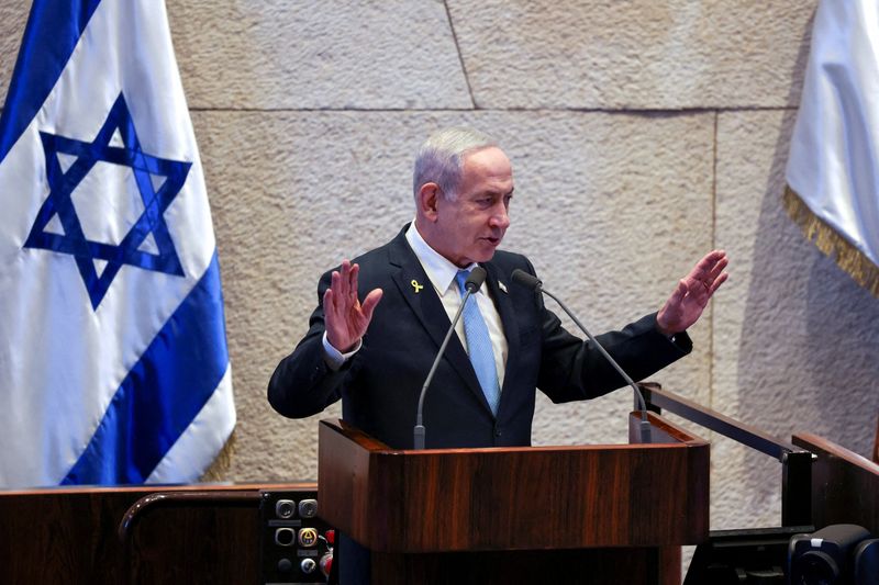 FILE PHOTO: Israeli Prime Minister Benjamin Netanyahu speaks during a Plenum session of the Knesset, Israel's Parliament, also attended by Argentine President Javier Milei, in Jerusalem, June 11, 2025 REUTERS/Ronen Zvulun/File photo