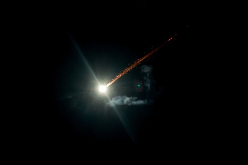 A missile launched from Iran is seen from Jerusalem, June 13. REUTERS/Ammar Awad