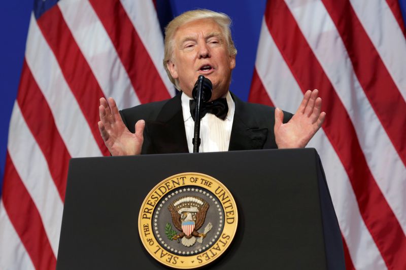 FILE PHOTO: U.S. President Donald Trump speaks at the Armed Services Ball in Washington, U.S., January 20, 2017. REUTERS/Yuri Gripas/File Photo