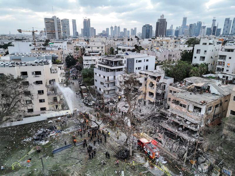 FILE PHOTO: A drone photo shows the damage over residential homes at the impact site following missile attack from Iran on Israel, in Tel Aviv, Israel June 16, 2025. REUTERS/Moshe Mizrahi/File Photo