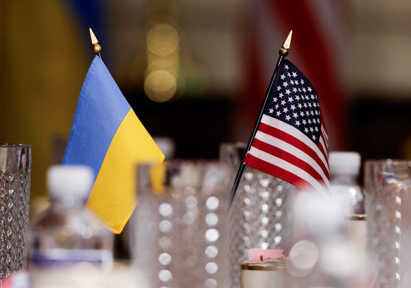 FILE PHOTO: Flags of Ukraine and U.S. are pictured during a meeting between the U.S. Secretary of Defense Lloyd Austin and Ukrainian Defense Minister Rustem Umerov at the Pentagon, in Washington, U.S., August 30, 2024. REUTERS/Daniel Becerril/ File Photo