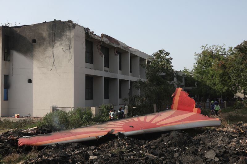 FILE PHOTO: Wreckage of a Boeing 787 Dreamliner lies at the site where the Air India plane crashed in Ahmedabad, India, June 12, 2025. REUTERS/Amit Dave/File photo