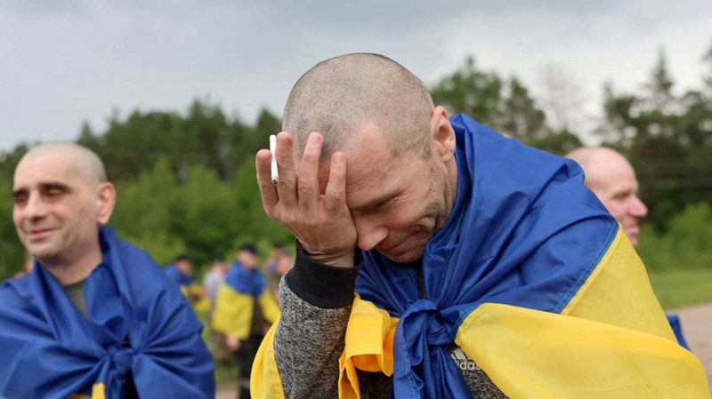 A Ukrainian prisoner of war (POW) reacts after a swap, amid Russia's attack on Ukraine, at an unknown location in Ukraine, June 19, 2025. Ukrainian Presidential Press Service/Handout via REUTERS