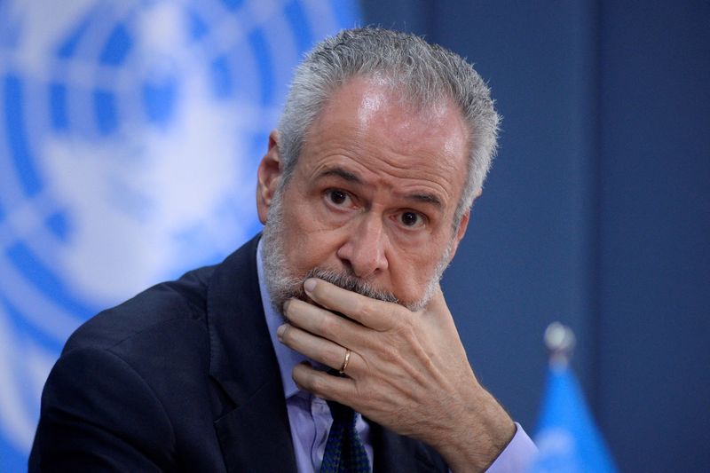 FILE PHOTO: COP30 President Ambassador Andre Correa do Lago listens to Simon Stiell, Secretary of UN Climate Change (UNFCCC), during an event in Brasilia, Brazil February 6, 2025. REUTERS/Andressa Anholete/File Photo