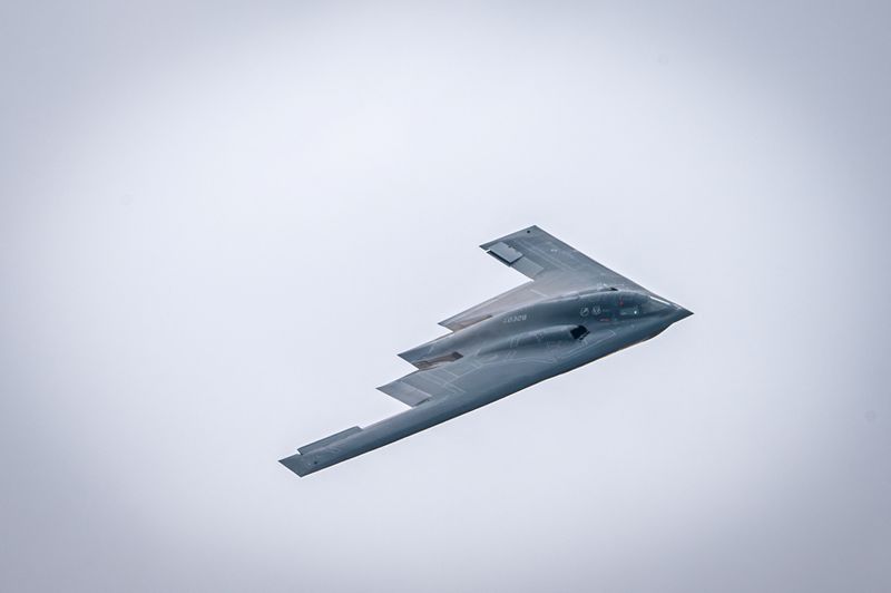 FILE PHOTO: U.S. Air Force B-2 Spirit bomber, assigned to the 509th Bomb Wing out of Whiteman Air Force Base, Missouri, performs a fly-over during the Speed of Sound Airshow, at Rosecrans Air National Guard Base in St. Joseph, Missouri, U.S. September 14, 2024.  U.S. Air National Guard/Master Sgt. Patrick Evenson/Handout via REUTERS/File Photo