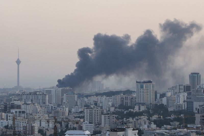 FILE PHOTO: Smoke rises following an Israeli attack on the IRIB building, the country's state broadcaster, in Tehran, Iran, June 16, 2025. Majid Asgaripour/WANA (West Asia News Agency) via REUTERS/File Photo
