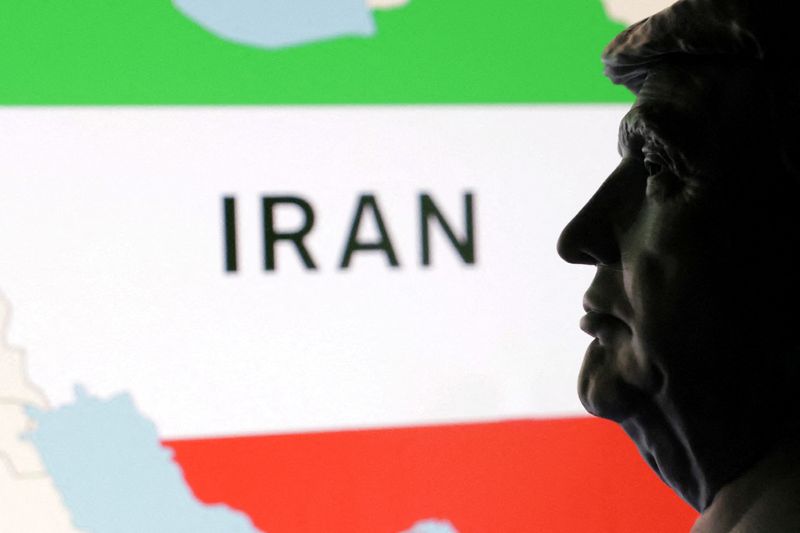 FILE PHOTO: 3D printed miniature of U.S. President Donald Trump's face and map of Iran are seen in this illustration taken June 23, 2025. REUTERS/Dado Ruvic/Illustration/File Photo