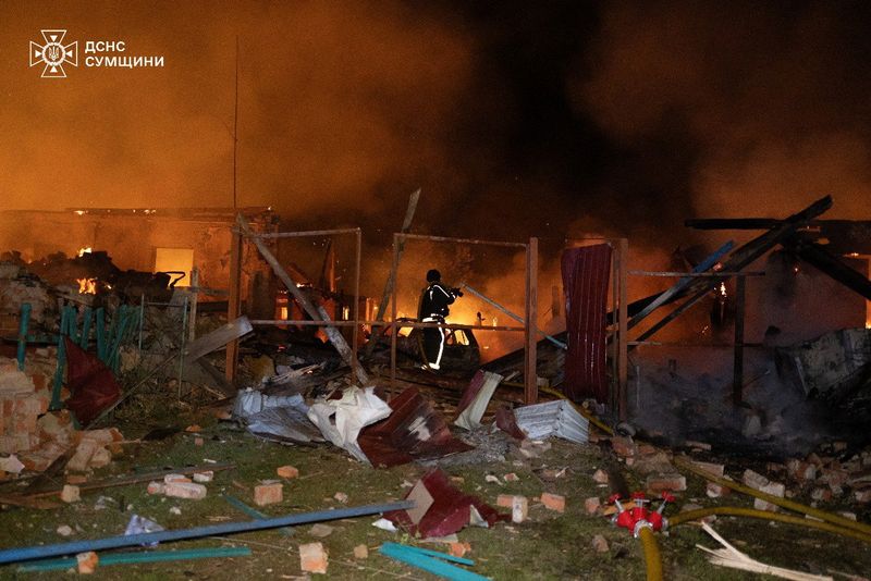 A rescuer works at a site following a Russian drone attack at a location given as Sumy region, Ukraine, in this handout image released on June 24, 2025. State Emergency Service Of Ukraine/Handout via REUTERS  THIS IMAGE HAS BEEN SUPPLIED BY A THIRD PARTY. MANDATORY CREDIT. DO NOT OBSCURE LOGO.