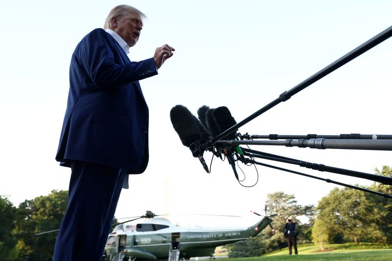 U.S. President Donald Trump speaks to media ahead of boarding Marine One to depart to attend the NATO Summit in The Hague, Netherlands, from the South Lawn at the White House in Washington, D.C., U.S., June 24, 2025. REUTERS/Kevin Lamarque