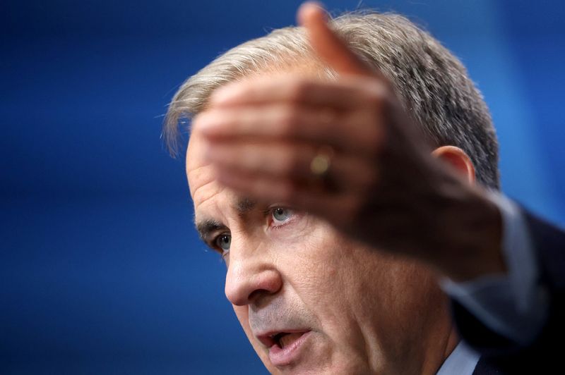 Canadian Prime Minister Mark Carney speaks during a press conference during a NATO summit in The Hague, Netherlands June 25, 2025.  REUTERS/Toby Melville