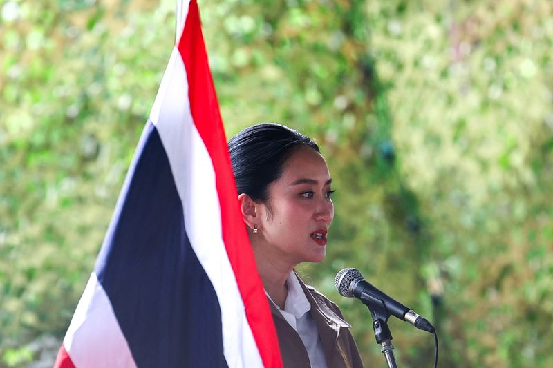 Thailand’s Prime Minister Paetongtarn Shinawatra speaks to administrative officials at the 12th Infantry Regiment, 3rd Infantry Battalion (Fort Surasinghanat) of a Thailand-Cambodia border town of Aranyaprathet district, as she battles to stay in power after drawing sharp criticism of her handling of a border row with Cambodia, in Sa Kaeo province, Thailand, June 26, 2025. REUTERS/Athit Perawongmetha