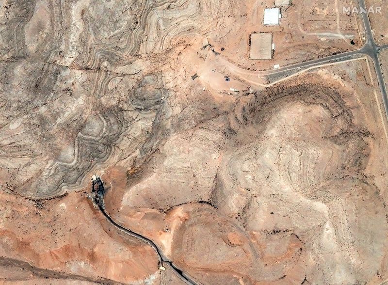 FILE PHOTO: A satellite image shows damage to the tunnel entrances of the Isfahan Nuclear Technology Research Center, following U.S. airstrikes amid the Iran-Israel conflict, in Isfahan, Iran, June 22, 2025. Maxar Technologies/Handout via REUTERS/File Photo
