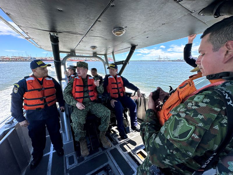 FILE PHOTO: Colombia's armed forces commander, Admiral Francisco Cubides, speaks with Colombian Navy members during a maritime security tour in Buenaventura, Colombia June 28, 2025. REUTERS/Javier Andres Rojas/File Photo