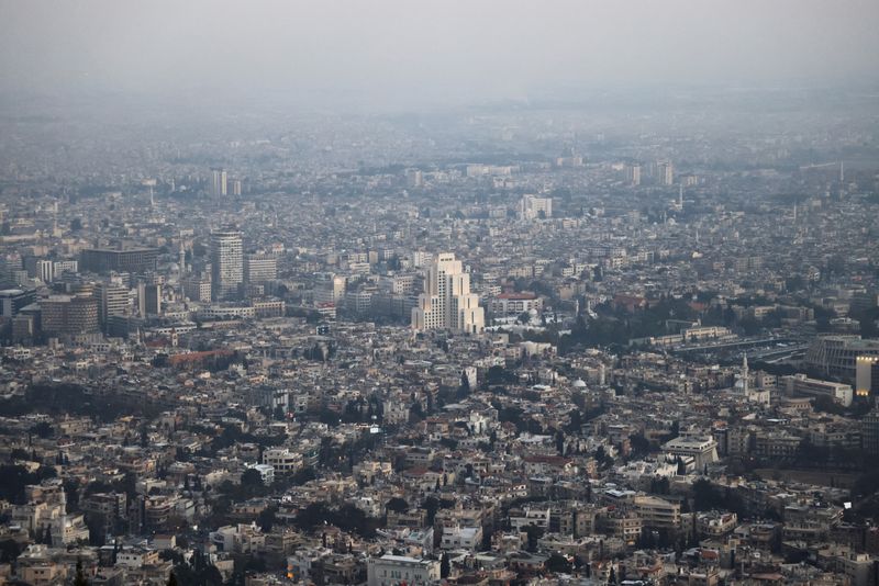 FILE PHOTO: A general view shows Damascus from Mount Qasioun, after one month since the ousting of Syria's Bashar al-Assad, in Damascus, Syria, January 7, 2025. REUTERS/Khalil Ashawi/File Photo