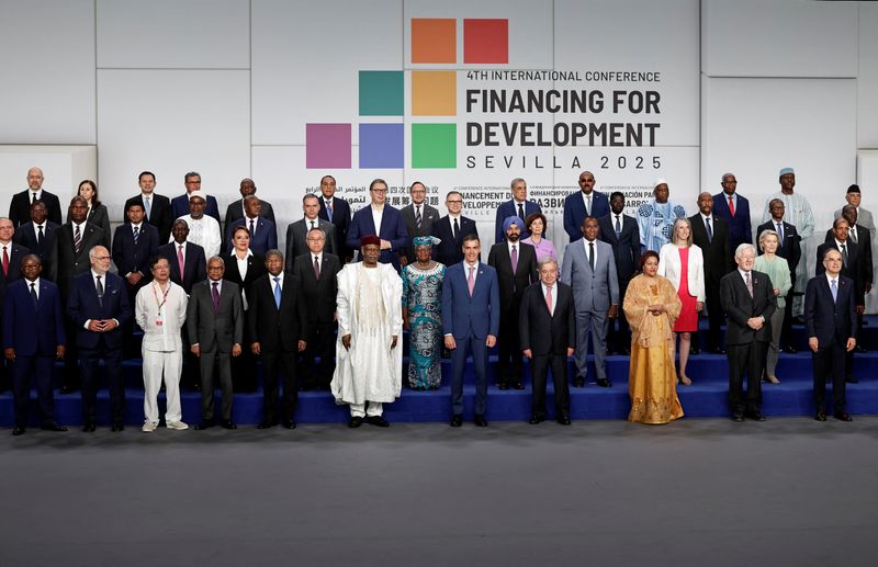 Spanish Prime Minister Pedro Sanchez, UN Secretary-General Antonio Guterres and other authorities pose for a family photo during the opening ceremony of the 4th International Conference on Financing for Development, in Seville, Spain, June 30, 2025. REUTERS/Jon Nazca