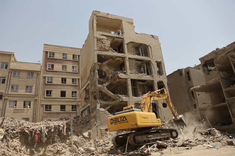 FILE PHOTO: A view shows the aftermath of an Israeli strike on a building on Monday, after the ceasefire deal between Israel and Iran, in Tehran, Iran, June 26, 2025. Majid Asgaripour/WANA (West Asia News Agency) via REUTERS   ATTENTION EDITORS - THIS PICTURE WAS PROVIDED BY A THIRD PARTY/File Photo