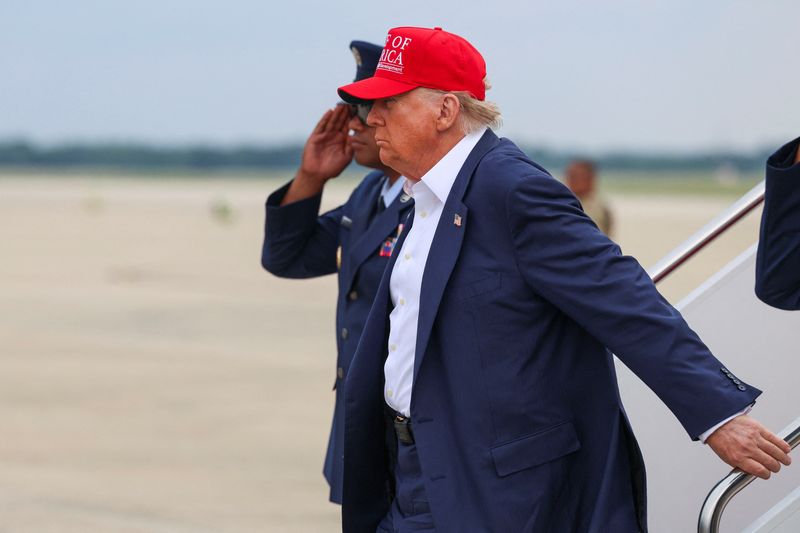 FILE PHOTO: U.S. President Donald Trump arrives at the airport after touring a temporary migrant detention center informally known as "Alligator Alcatraz" in Ochopee, Florida, at Joint Base Andrews, Maryland, U.S., July 1, 2025. REUTERS/Evelyn Hockstein/File Photo