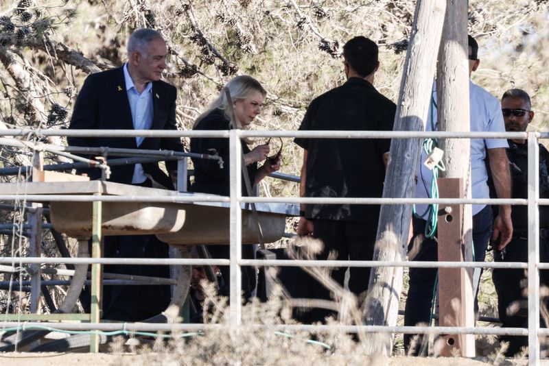 Israeli Prime Minister Benjamin Netanyahu looks on, during his visit for the first time since the October 7, 2023 attack in Nir Oz, Israel July 3, 2025. REUTERS/Amir Cohen