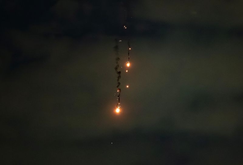 An explosion of a drone is seen in the sky over the city during a Russian drone strike, amid Russia's attack on Ukraine, in Kyiv, Ukraine July 4, 2025. REUTERS/Vladyslav Sodel