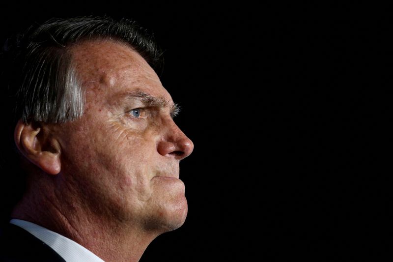 FILE PHOTO: Former Brazilian President Jair Bolsonaro looks on during "Power of The People" event hosted by Turning Point USA at Trump National Doral Miami Resort in Doral, Florida, U.S., February 3, 2023. REUTERS/Marco Bello/File Photo